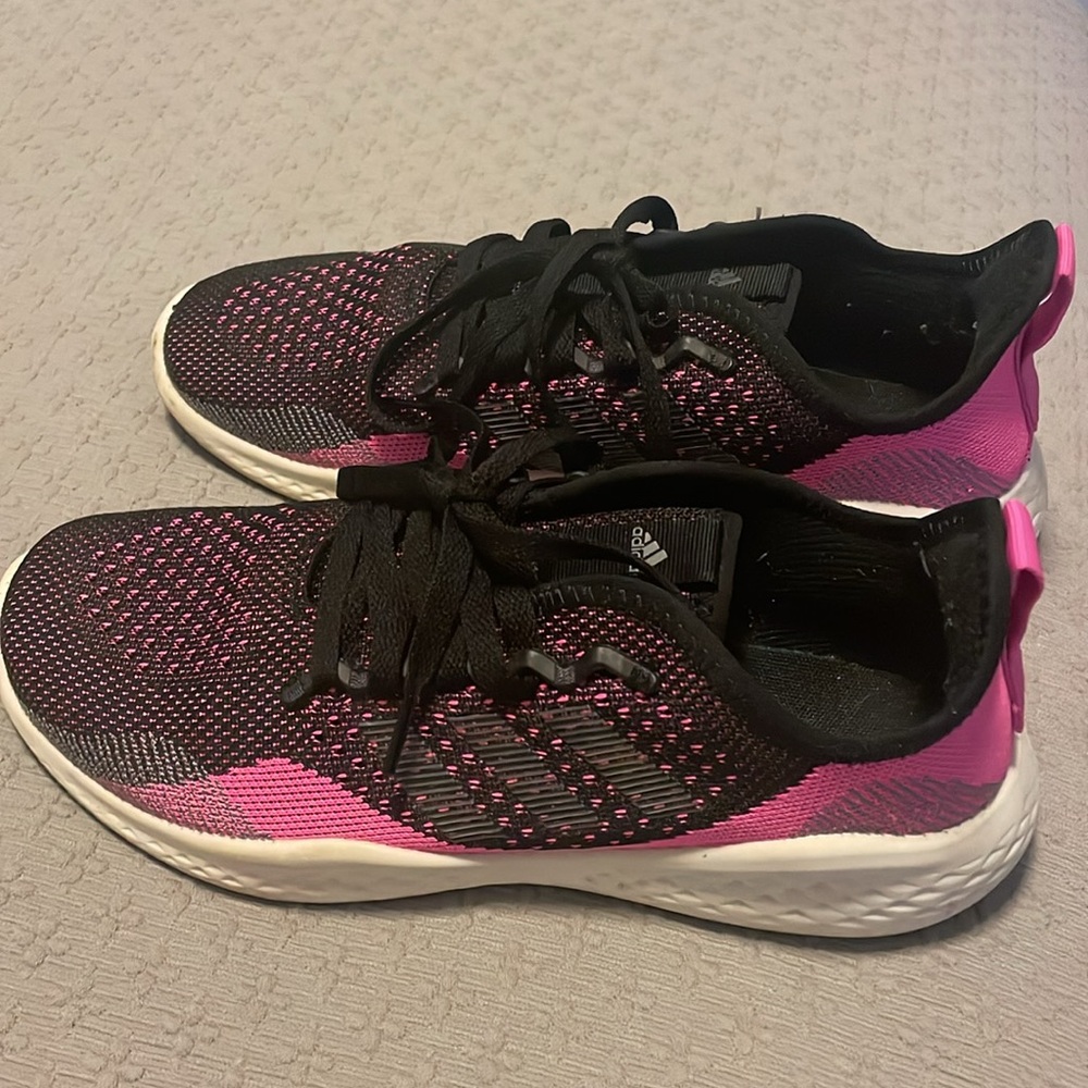 Black and pink adidas bounce shoes
